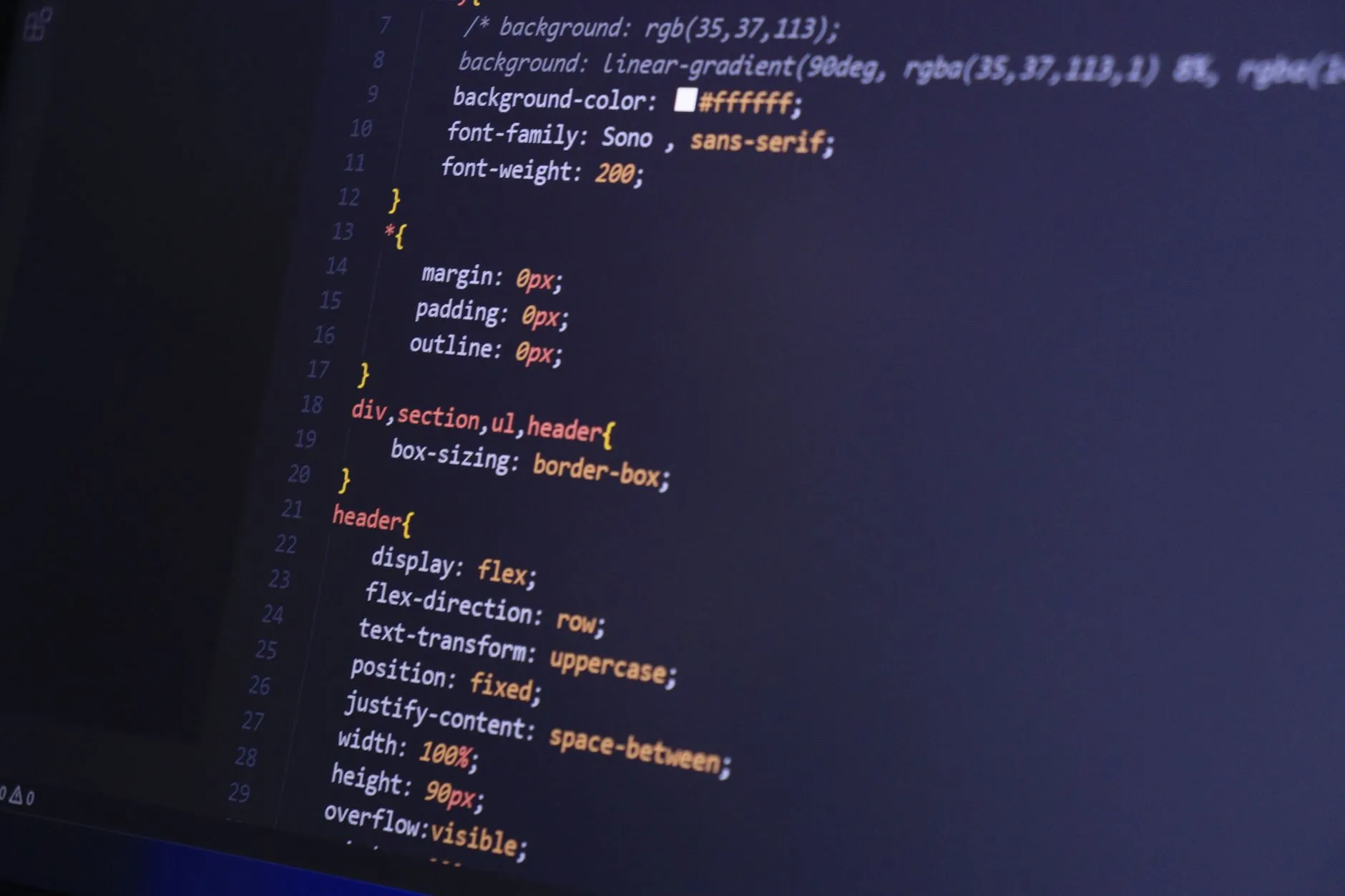 Source code on a dark monitor